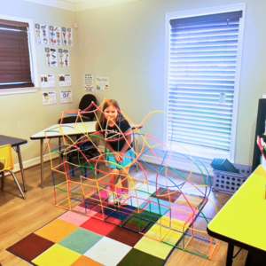 Kingwood TX private school students collaborating on engineering and building projects in small groups